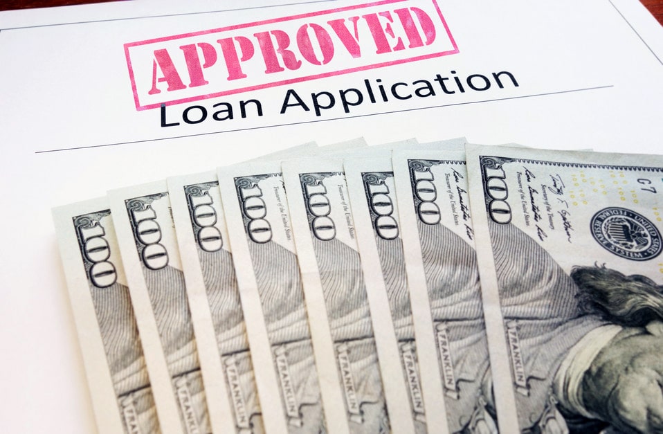 Approved auto title loan application and cash